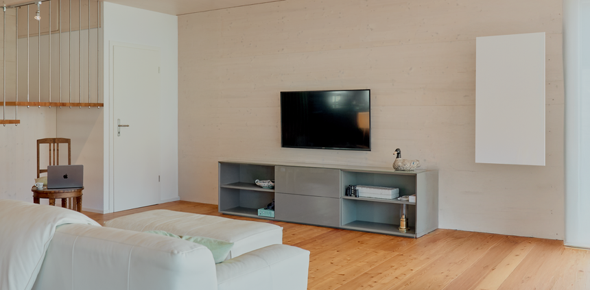 ecofort Infrarotheizung in modernem Wohnzimmer